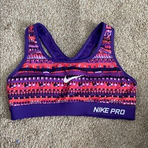 Purple and red patterned Nike sports bra